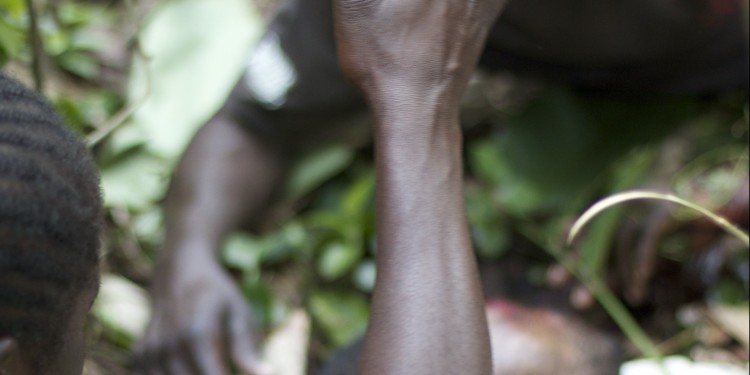 A family mourns a massacre victim in Mokoko, Ocotber 2014 (Photo: Dearbhla Glynn)