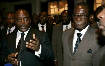 Zimbabwe President Robert Mugabe (R) and his Democratic Republic of Congo counterpart Joseph Kabila speak to the media after their meeting at the State House in Harare, November 2, 2009. REUTERS/Philimon Bulawayo